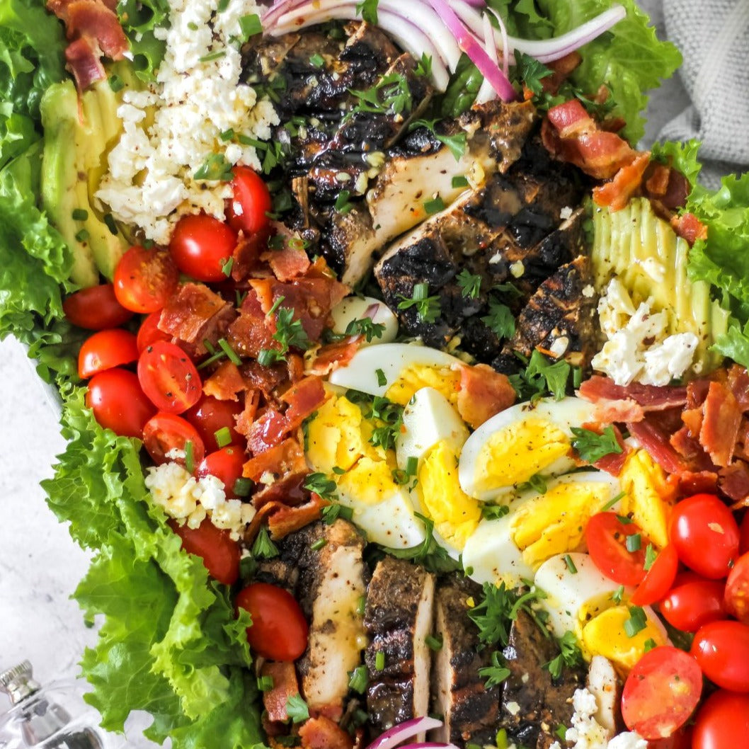Jamaica Jerk chicken in deconstructed salad platter.