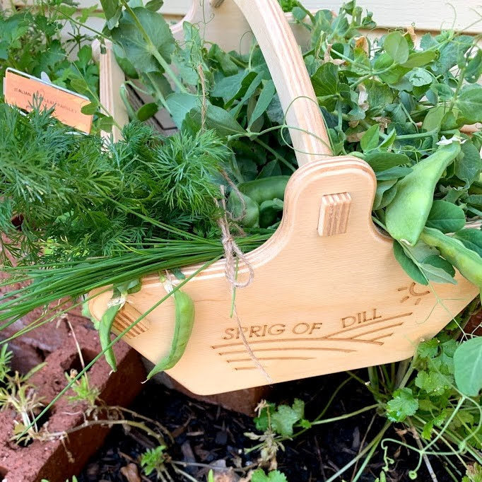 Sprig of Dill trug filled with fresh picked spring peas, dill, and chives.